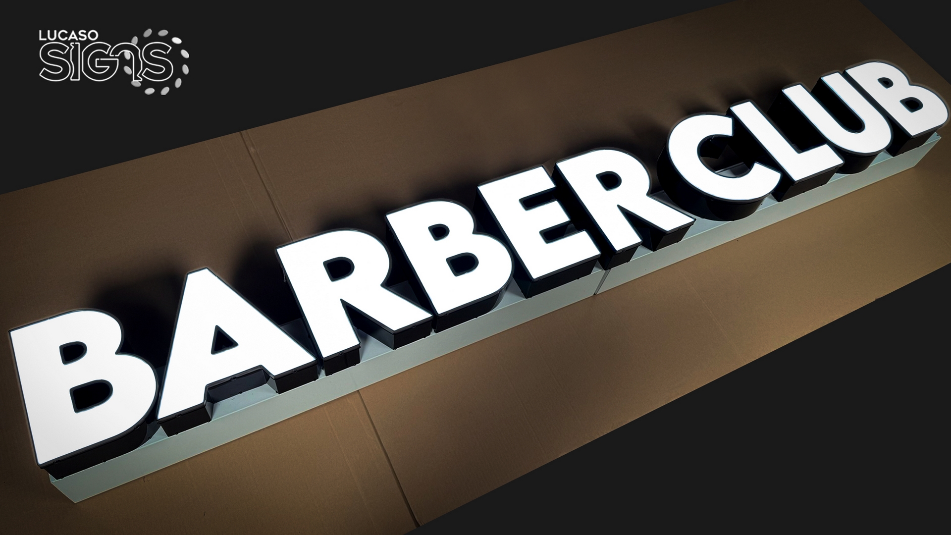 Barber shop sign on raceways by lucaso signs