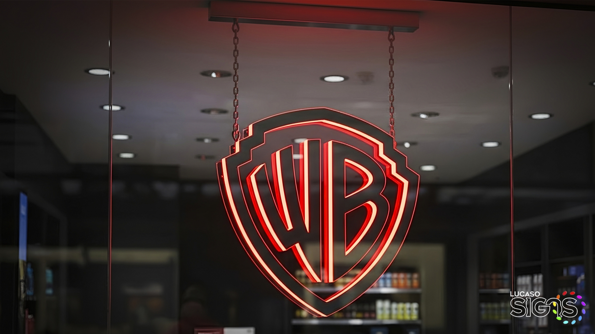 WB Emblem sign acrylic and neon window sign by lucaso signs