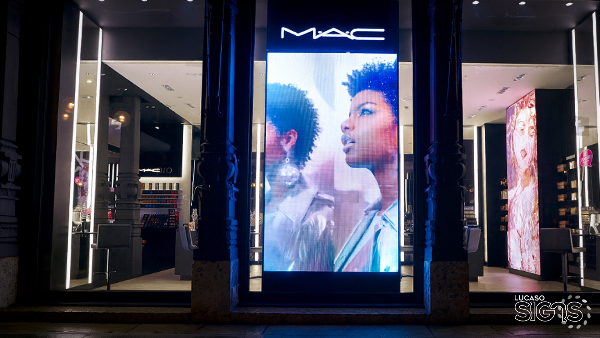High-resolution digital retail display sign with vibrant LED screen at MAC Cosmetics storefront by Lucaso Signs